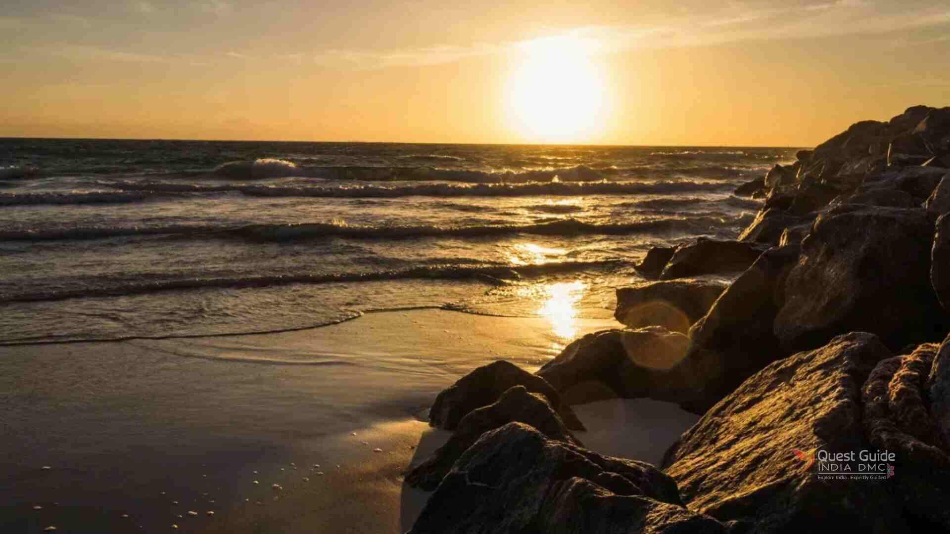 Sunset over Chilika Lake with calm waters and colorful sky